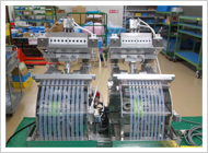 Modification of a parts conveyor system